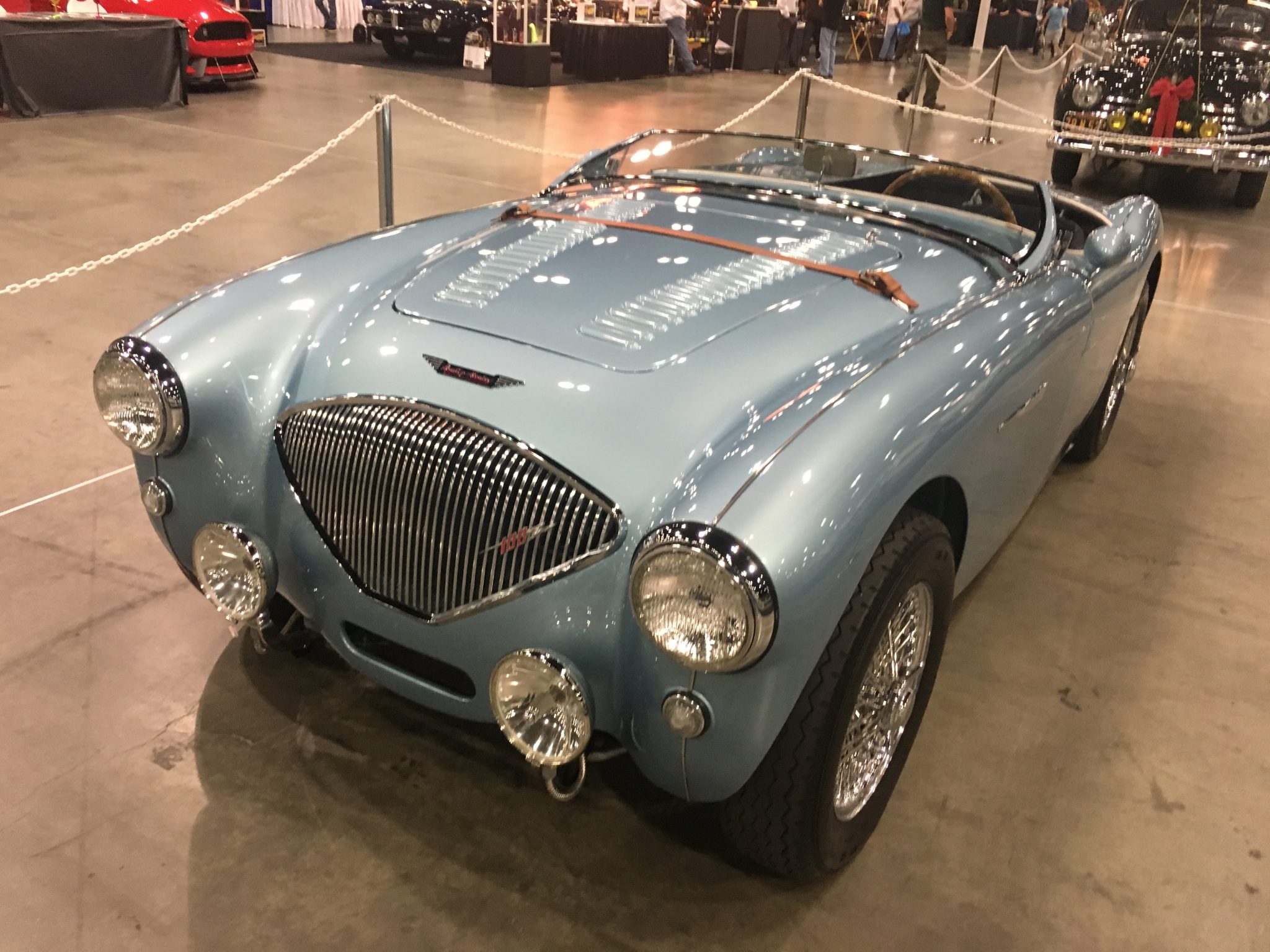 Classic English sports car, the 1956 Austin Healey 100 convertible. Note the low-profile, racy windscreen.